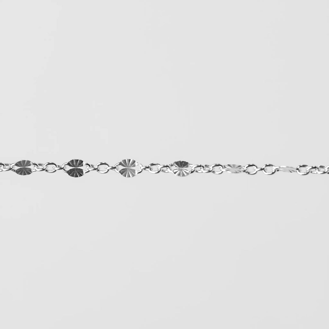 Brielle Permanent Jewelry Chain, Starburst Design, Figaro Chain, Available in Gold Options and Sterling Silver by Sunstone Welders